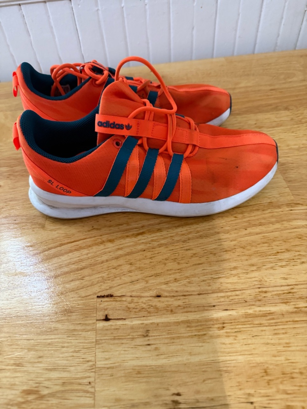 adidas Orange Trainers with Dark Blue Stripes